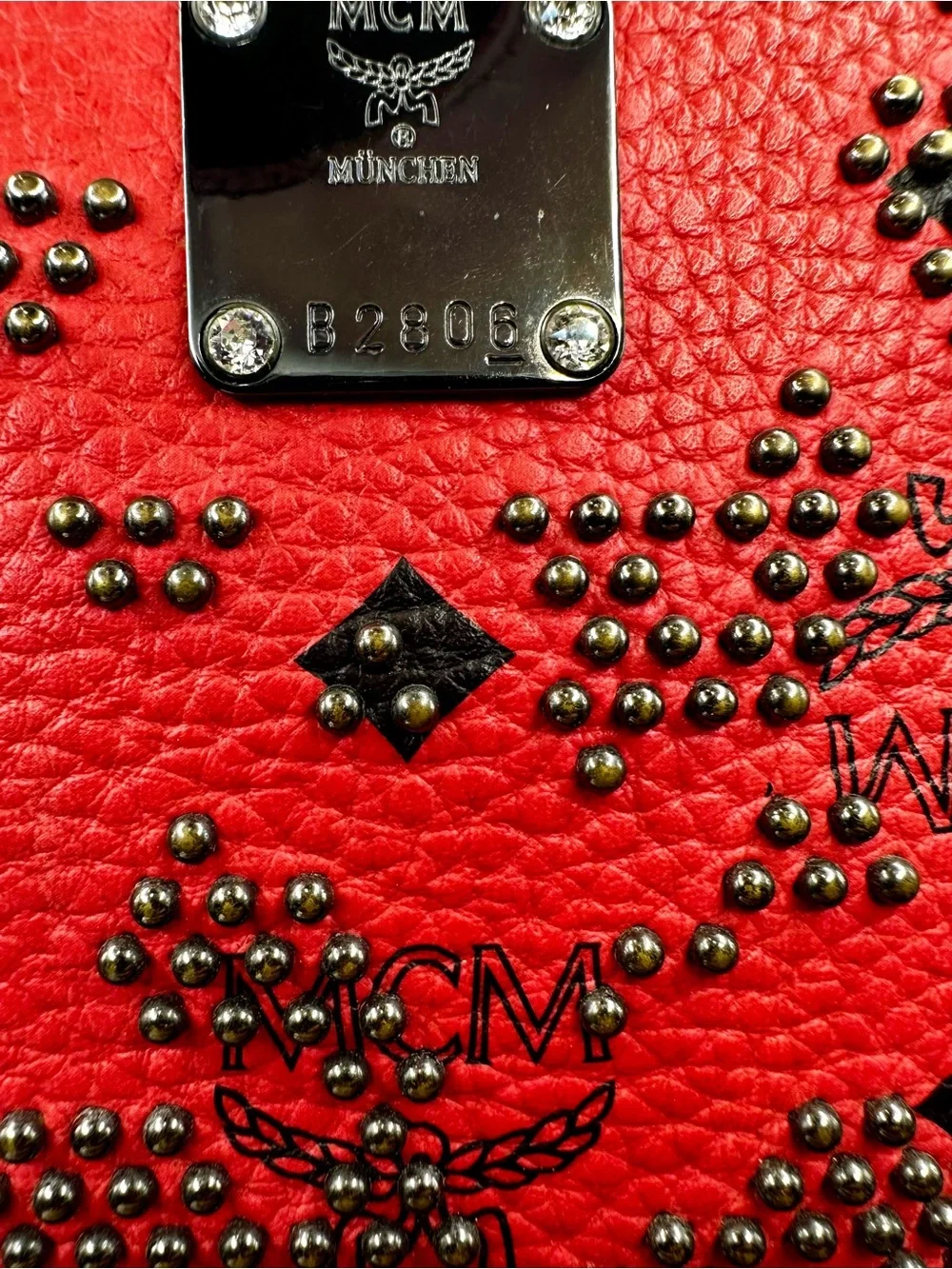 MCM Stark Red Leather Studded Backpack with Black Trim